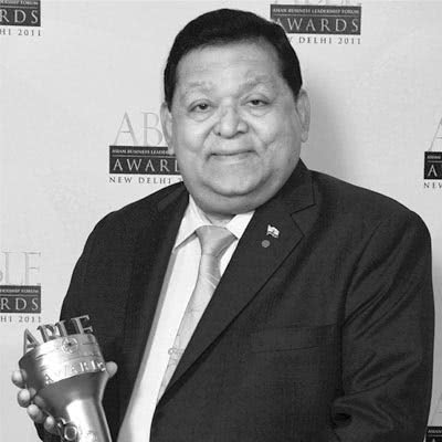 A.M. Naik